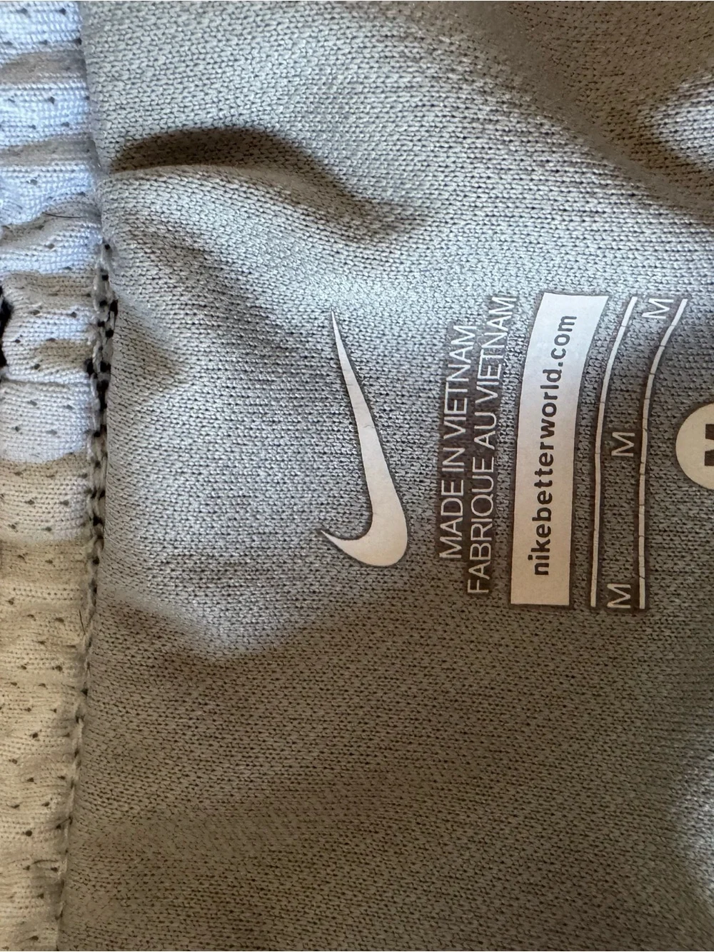 Nike Gray Athletic Shorts with White Swoosh